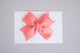 Simply Ellie Rose Coral Ribbon Bow